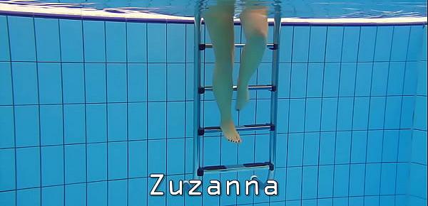  Big tits brunette babe Zuzanna swimming in the pool